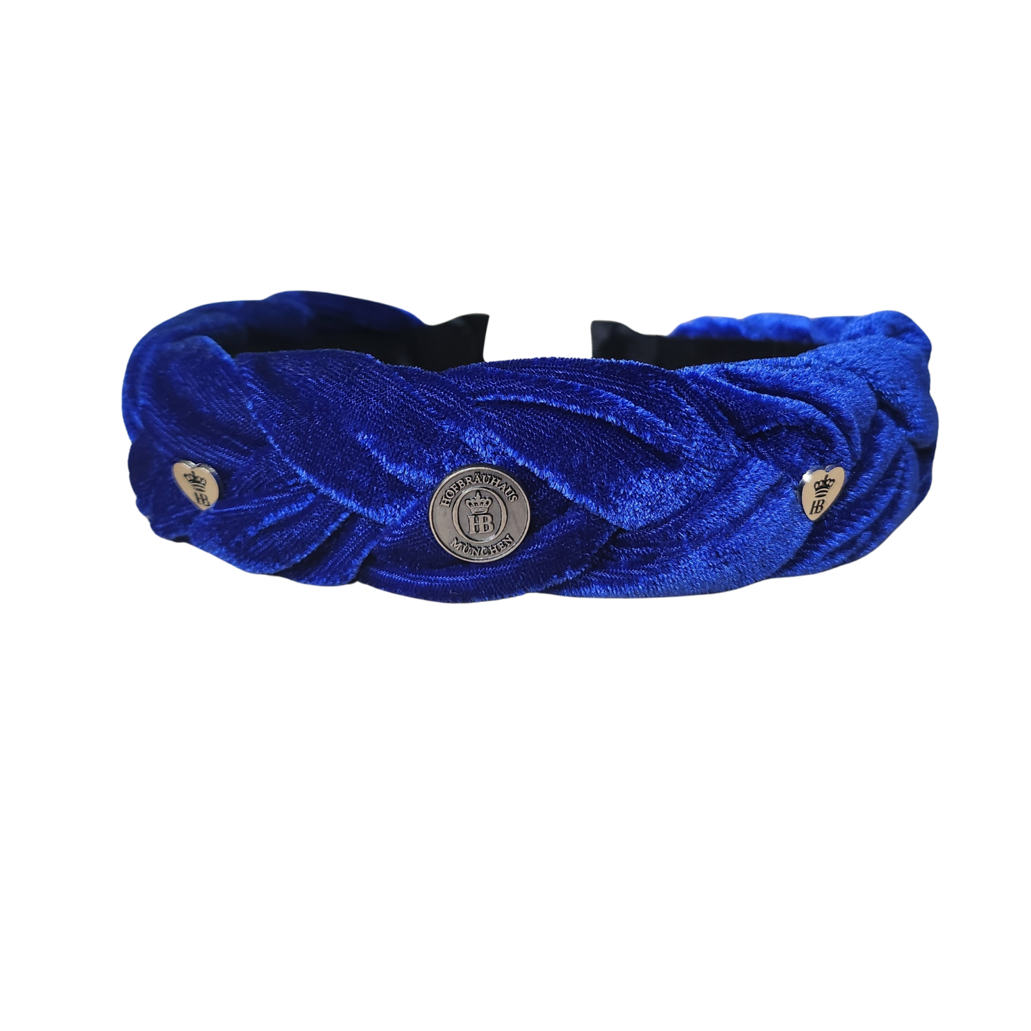 Blauer, geflochtener Haarreif aus Samt auf weißem Hintergrund. Draufsicht von oben mit Applikationen in Münzform und 2 Herzen, HB Logo auf Applikationen
