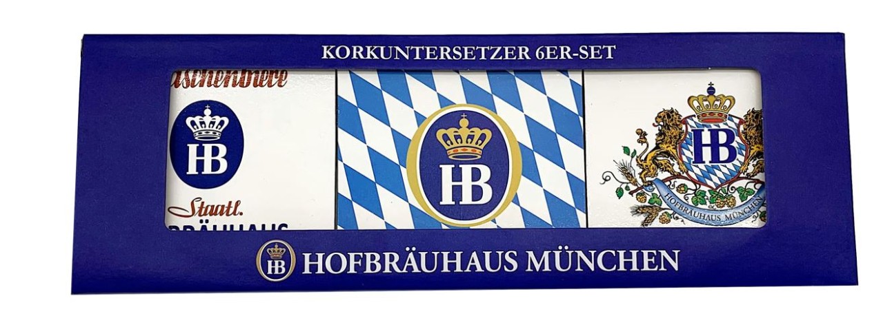 Set mit sechs Untersetzern im Hofbräuhaus München Design, verpackt in einer blauen Box mit Sichtfenster. Die Untersetzer zeigen verschiedene bayerische Motive, darunter das HB-Logo, das Rautenmuster der bayerischen Flagge und ein Wappen mit Löwen